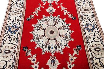 A runner carpet, Nain, part silk, 9 laa, c. 378 x 84 cm.