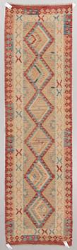 A kilim runner, around 300 x 85 cm.