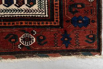 A rug, antique Baluch, ca 171 x 102-107 cm.