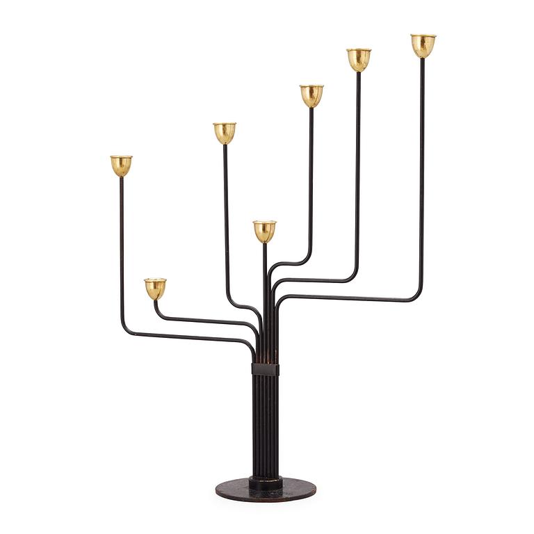 A Piet Hein brass and black lacquered metal candelabrum, 1950's-60's.