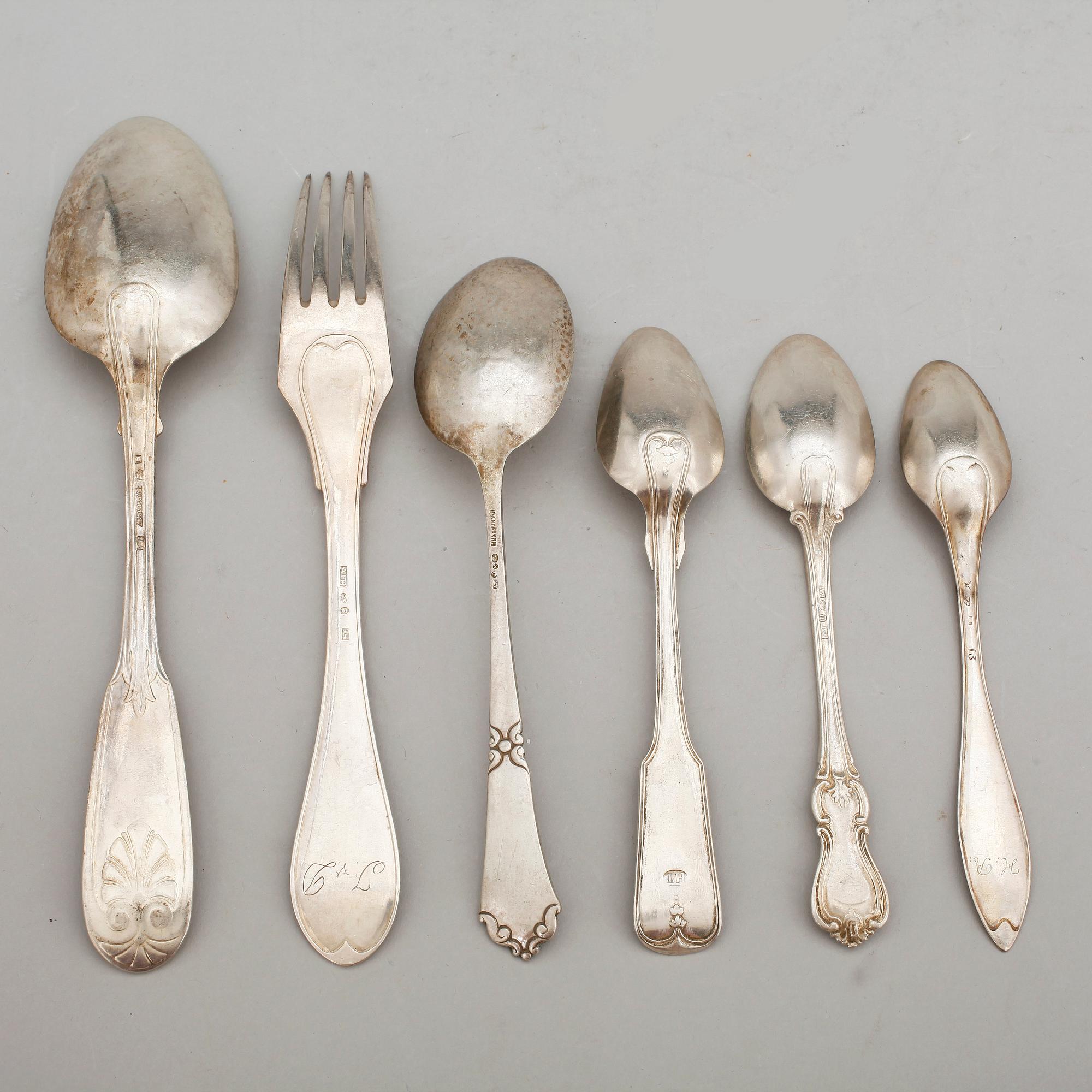 PARTI BESTICK, 18 st, silver, bland annat August Wilhelm Arnesen, Stockholm, 1869. Vikt ca 570g.