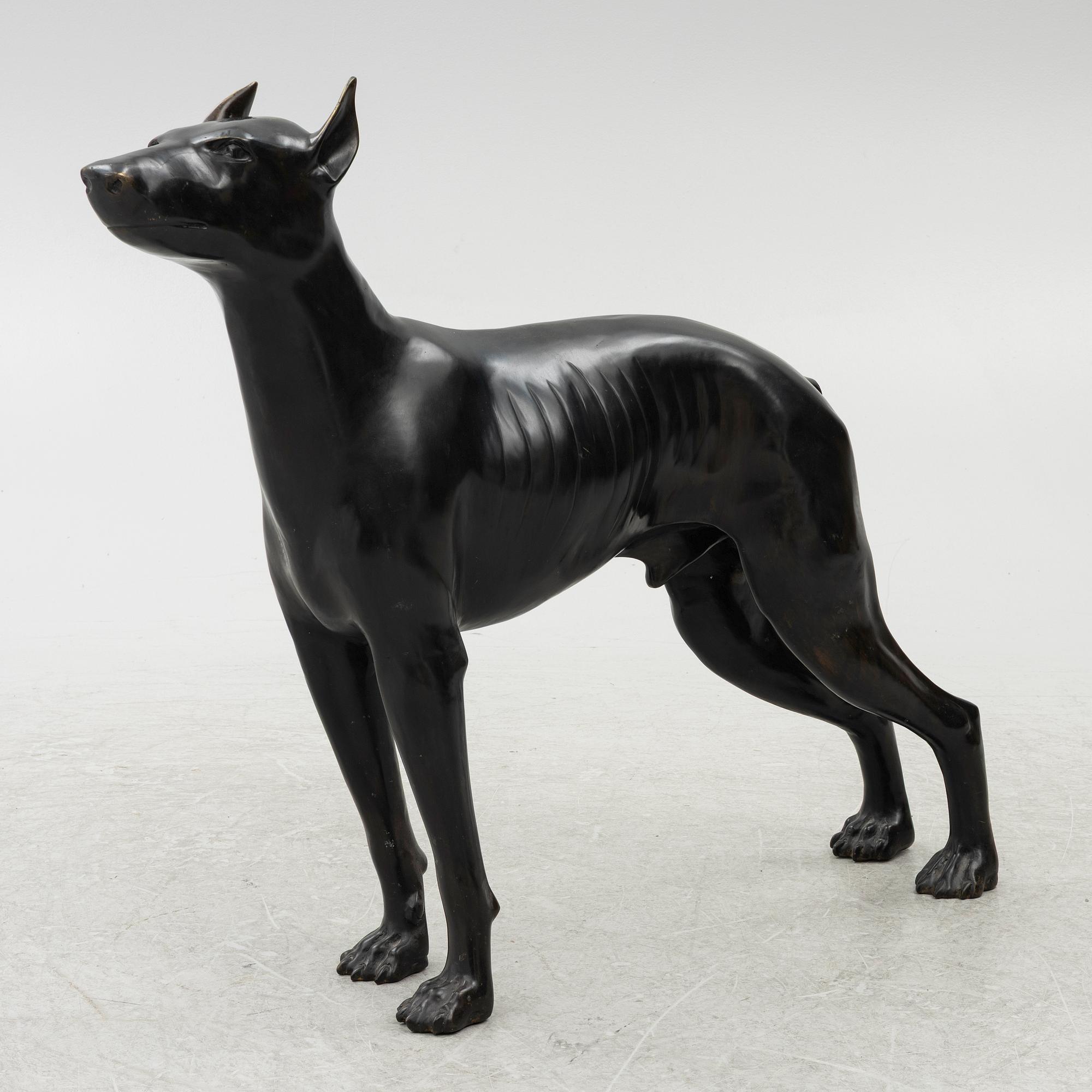 A decorative sculpture of a dog, 20th/21st century.