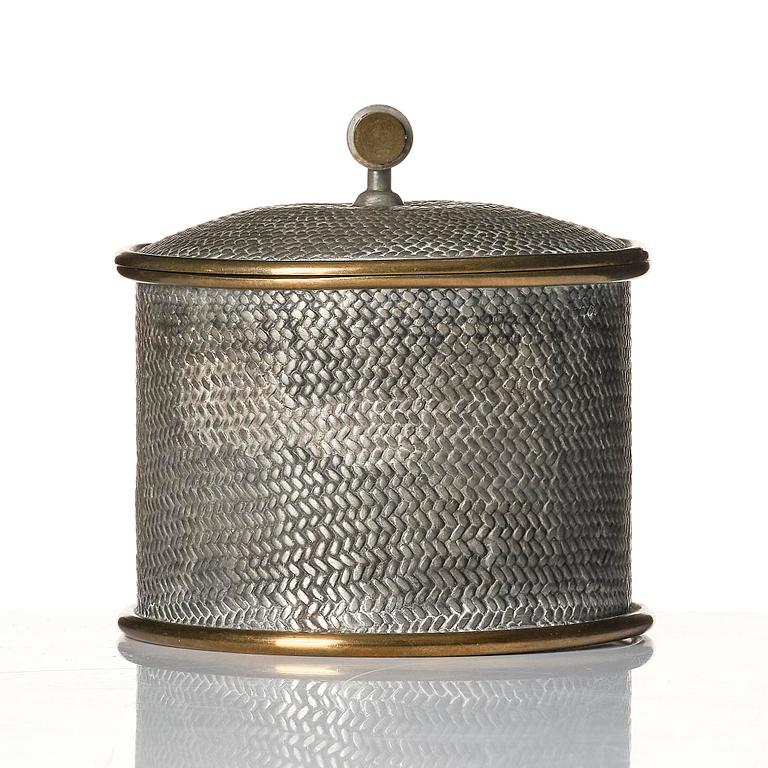 Björn Trägårdh, a pewter and brass lidded jar, model "A 2273", Firma Svenskt Tenn, Stockholm, 1944.