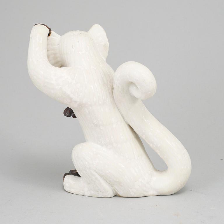 GUNNAR NYLUND, a stoneware sculpture of a monkey, Rörstrand mid 20th century.