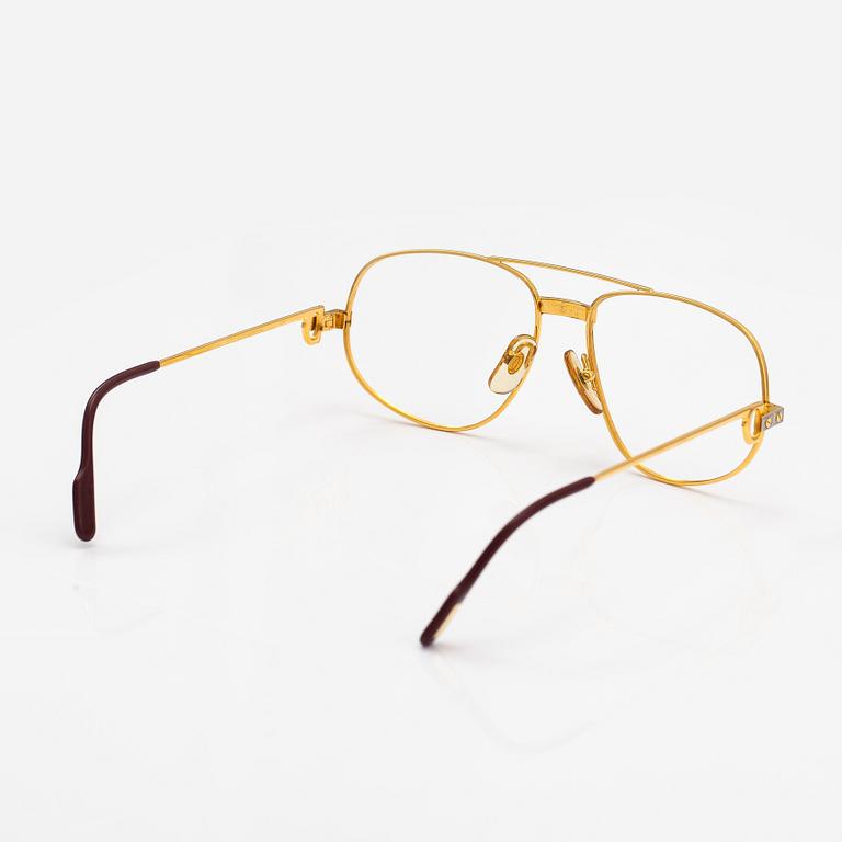 must de Cartier, Santos, a pair of eyeglass frames. Marked Cartier, Paris, Made in France 135, 56, 16.