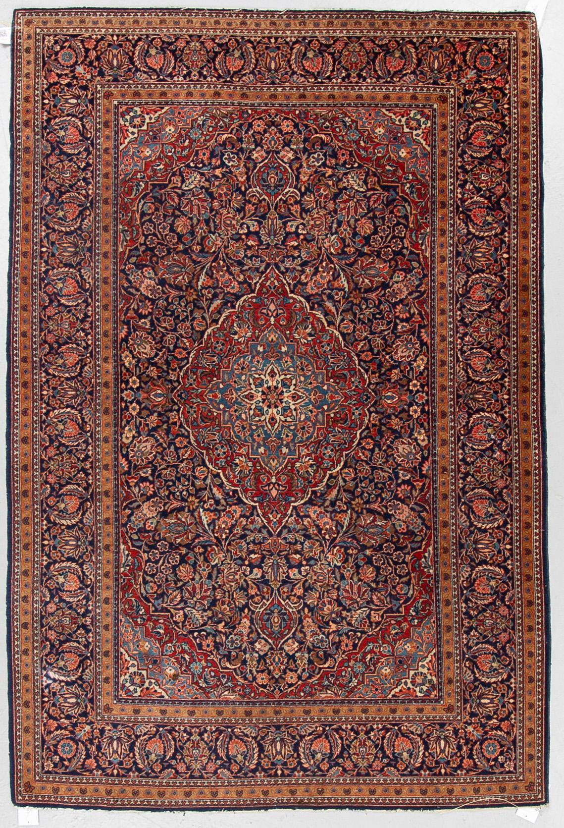 MATTO, a semi-antique Kashan, ca 203,5-205,5 x 135-137,5 cm.