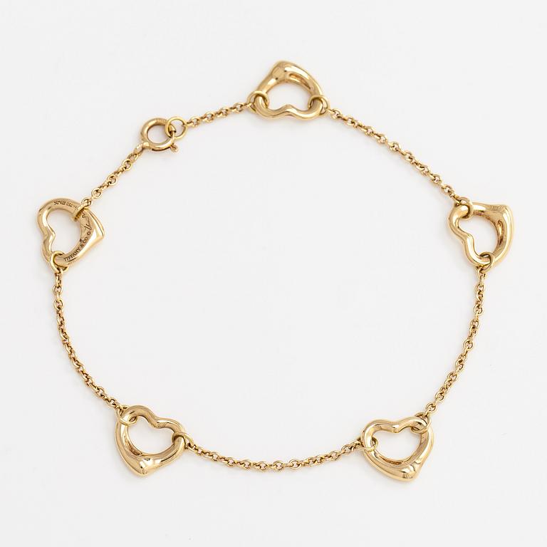Tiffany & Co, Elsa Peretti, an 18K gold 'Open Heart' bracelet.