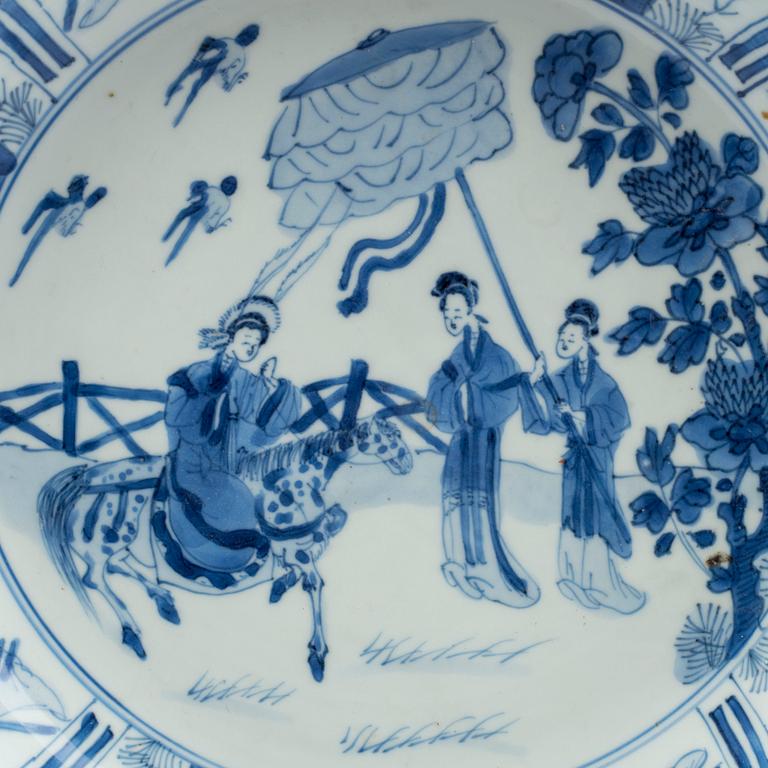 A large blue and white deep dish, Qing dynasty, with Kangxi six character mark and period (1662-1722).