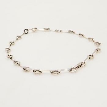 Efva Attling, halsband, ring, ett par örhängen, "Ring Chain", sterling silver.