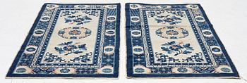 A pair of Baotou rugs, China, c. 120 x 64 cm.