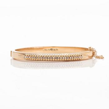 A 14K gold bracelet with single-cut diamonds, Kulta-Hamara Oy, Helsinki 1959.