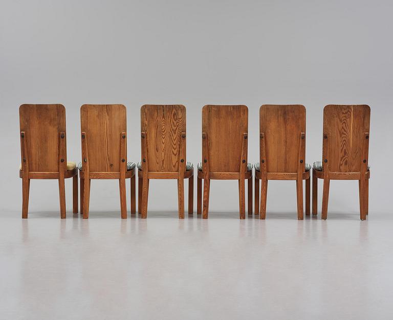 Axel Einar Hjorth, a set of six stained pine "Lovö" chairs, Nordiska Kompaniet, Sweden, 1930s.