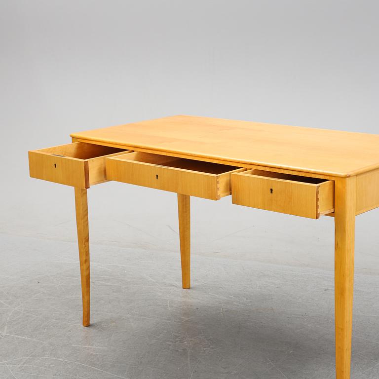 A 'Nya guldheden' desk by Carl Malmsten.