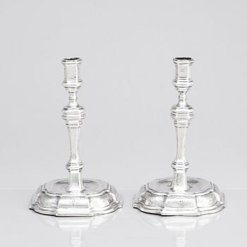 A pair of Swedish early 18th century silver candlesticks, mark of Petter Ersson Lund, Stockholm 1727.