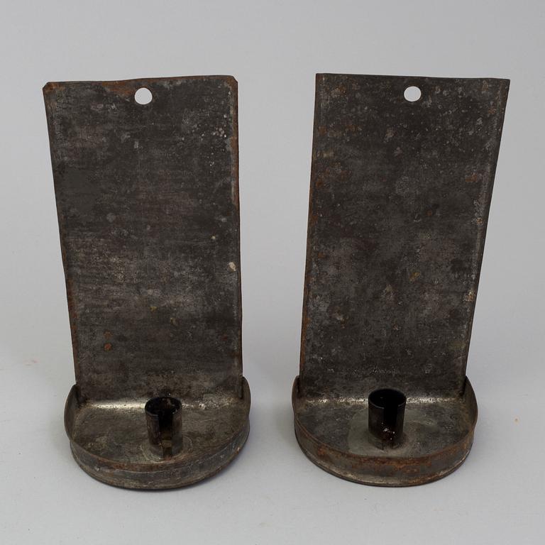 a pair of metal wall sconces, 19th century.