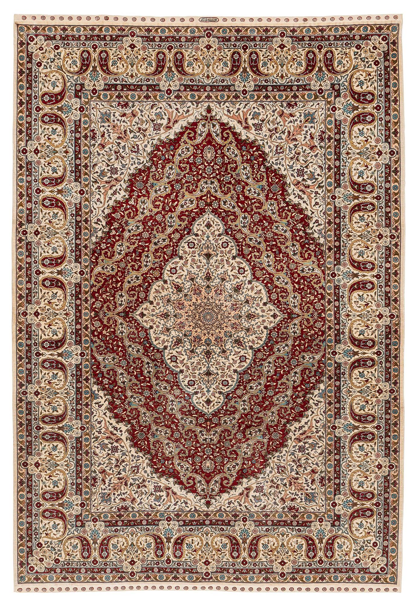 A semi-antique silk Hereke rug, West Anatolia, c. 180 x 121 cm.