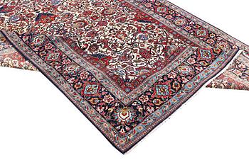 A semi.antique Kashan, c. 319 x 212 cm.