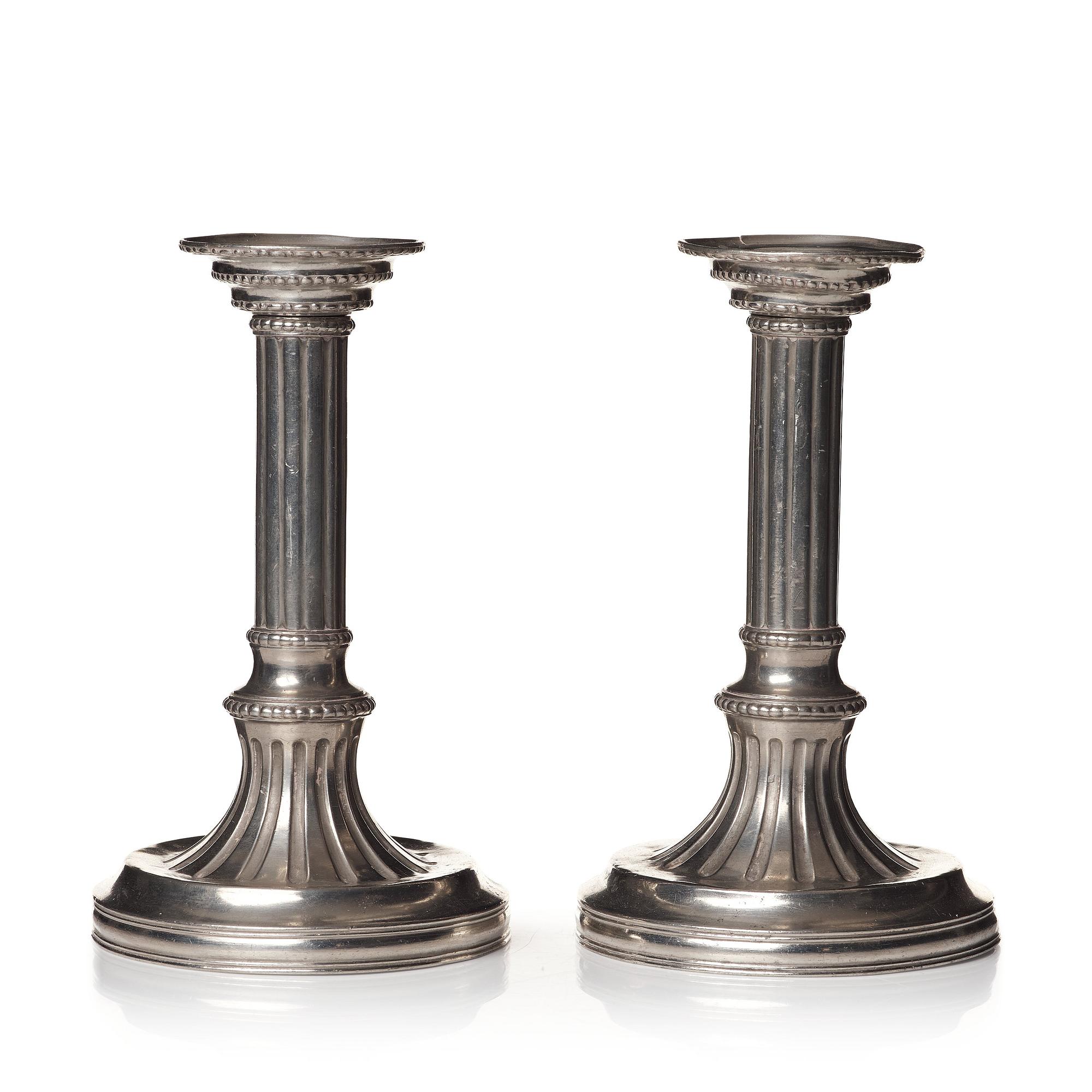 A pair of Gustavian pewter candlesticks by R Ryman 1784.