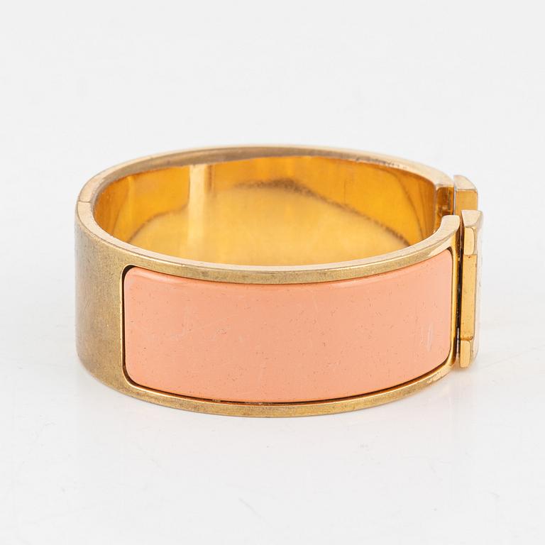 Hermès, a 'Clic Clac H' bracelet.