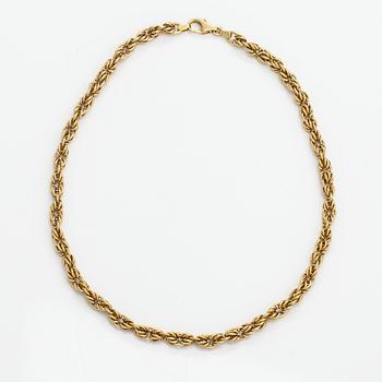 An 18K gold necklace. Unoaerre, Italy.