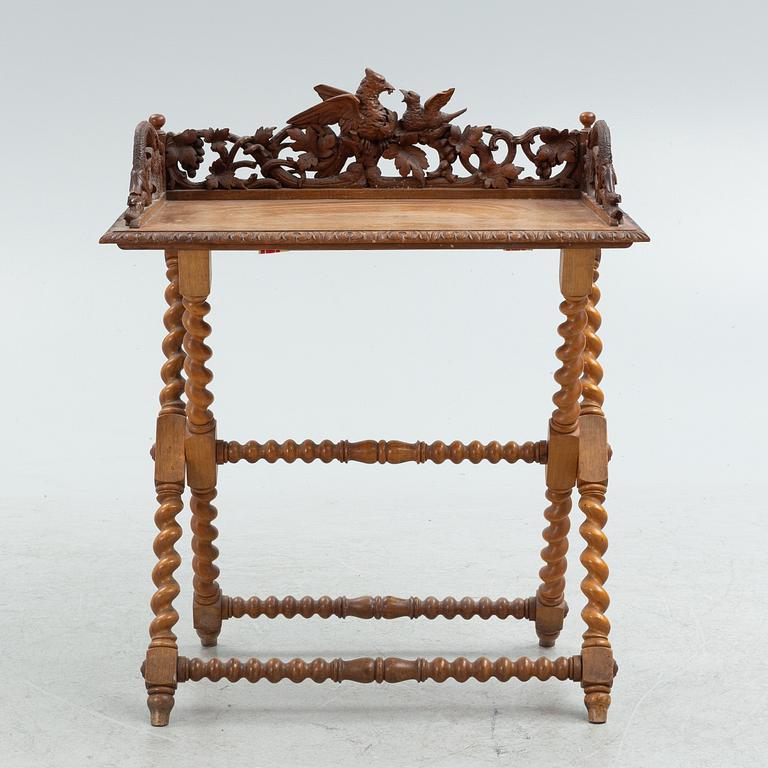 A Baroque-style serving table, circa 1900.