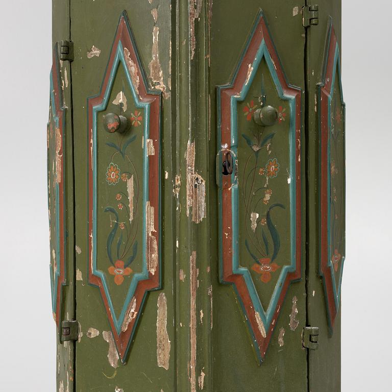 Corner cabinet, likely 18th century.