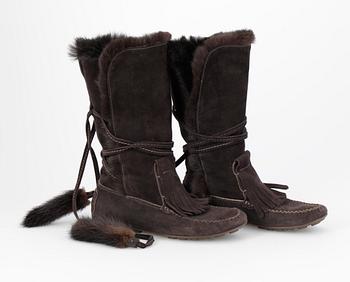 372. A pair of boots by Yves Saint Laurent.