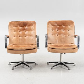 Kenneth Bergenblad, a pair of leather upholstered 'Herkules' armchairs from Dux.