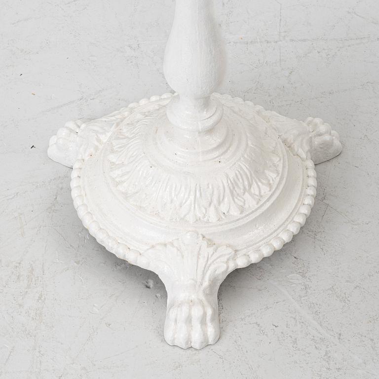 A pair of café tables, around 1900.