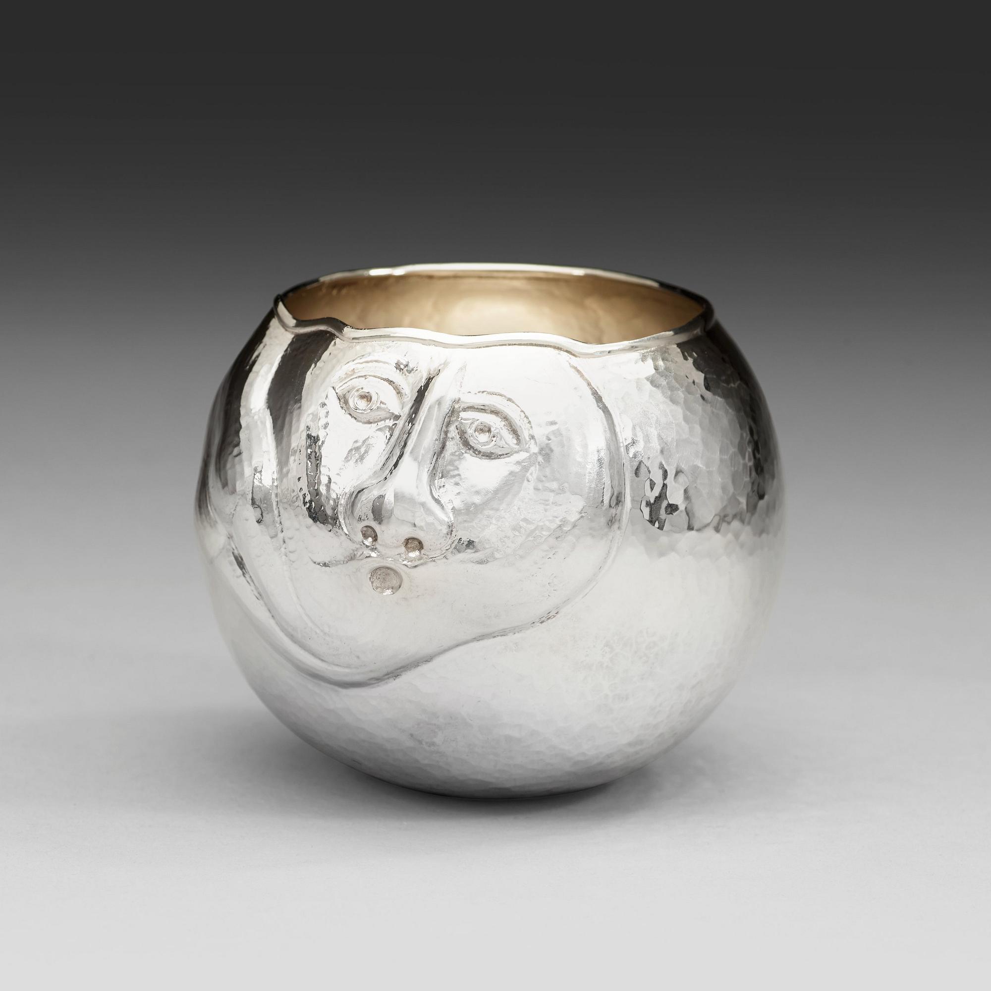 An Olle Ohlsson sterling vase.