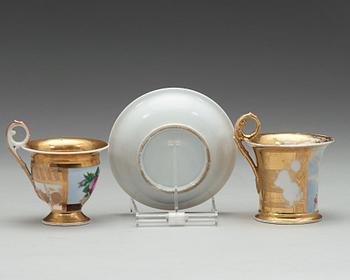 Empire, A Russian cup with saucer, Kudinovs Brothers factory (Завод братьев Кудиновых) and a single cup, Empire.