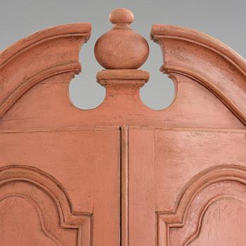 A rococo corner cabinet, later part 18th century.