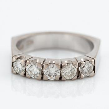 Ring, half eternity, 18K white gold with brilliant cut diamonds.