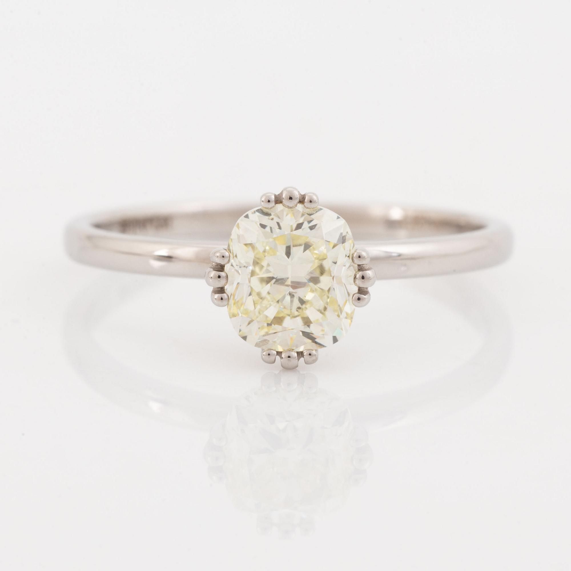 Cushion cut diamond ring.