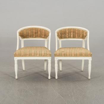 a pair of 19th century armchairs.