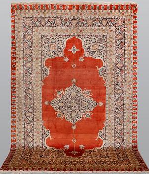 An Oriental silk carpet, signed, approx. 150 x 91 cm.