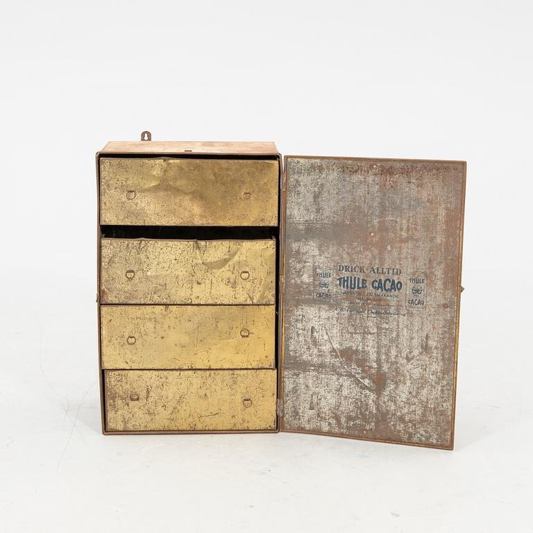 Plåtskåp "Thule" tidigt 1900-tal målad plåt.