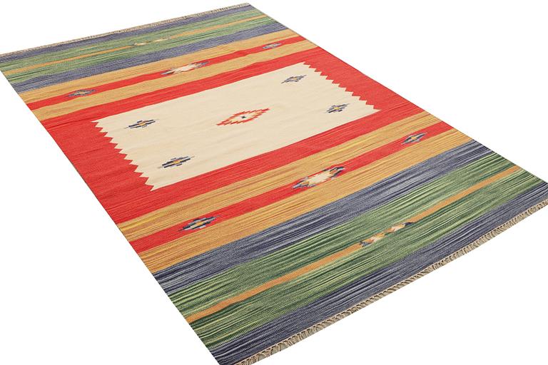 A Durry carpet, c. 300 x 200 cm.