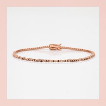 ARMBAND, ett riviére i rosa guld med briljanter, totalt ca 0.99ct.