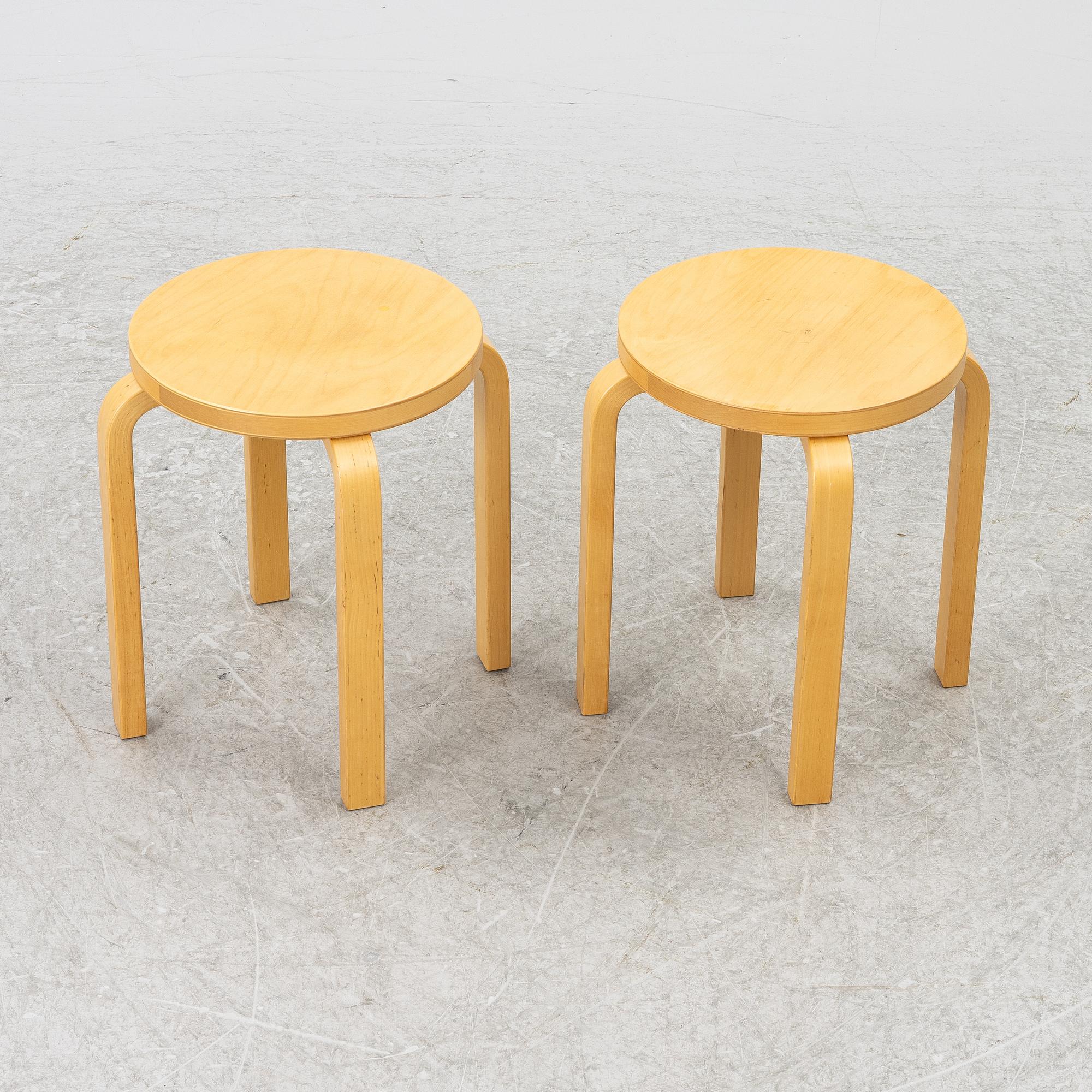 Alvar Aalto, a pair of model E60 stools, Artek, Finland.