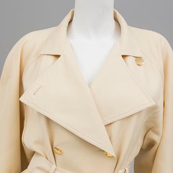 A trench-coat by Guy Laroche.