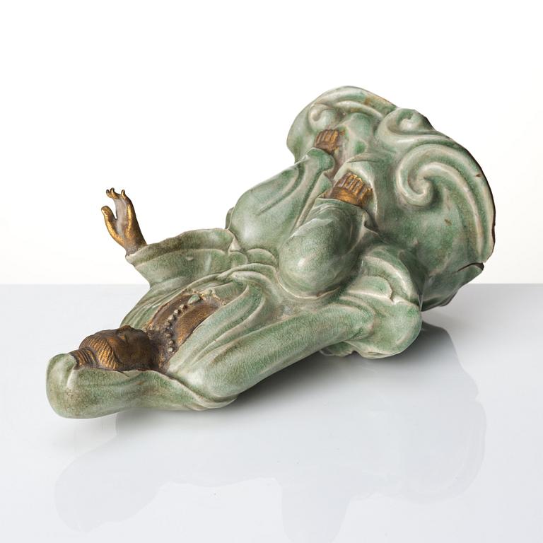 A seated celadon figure of Guanyin, presumably Longquan Ming dynasty, 17th Century.