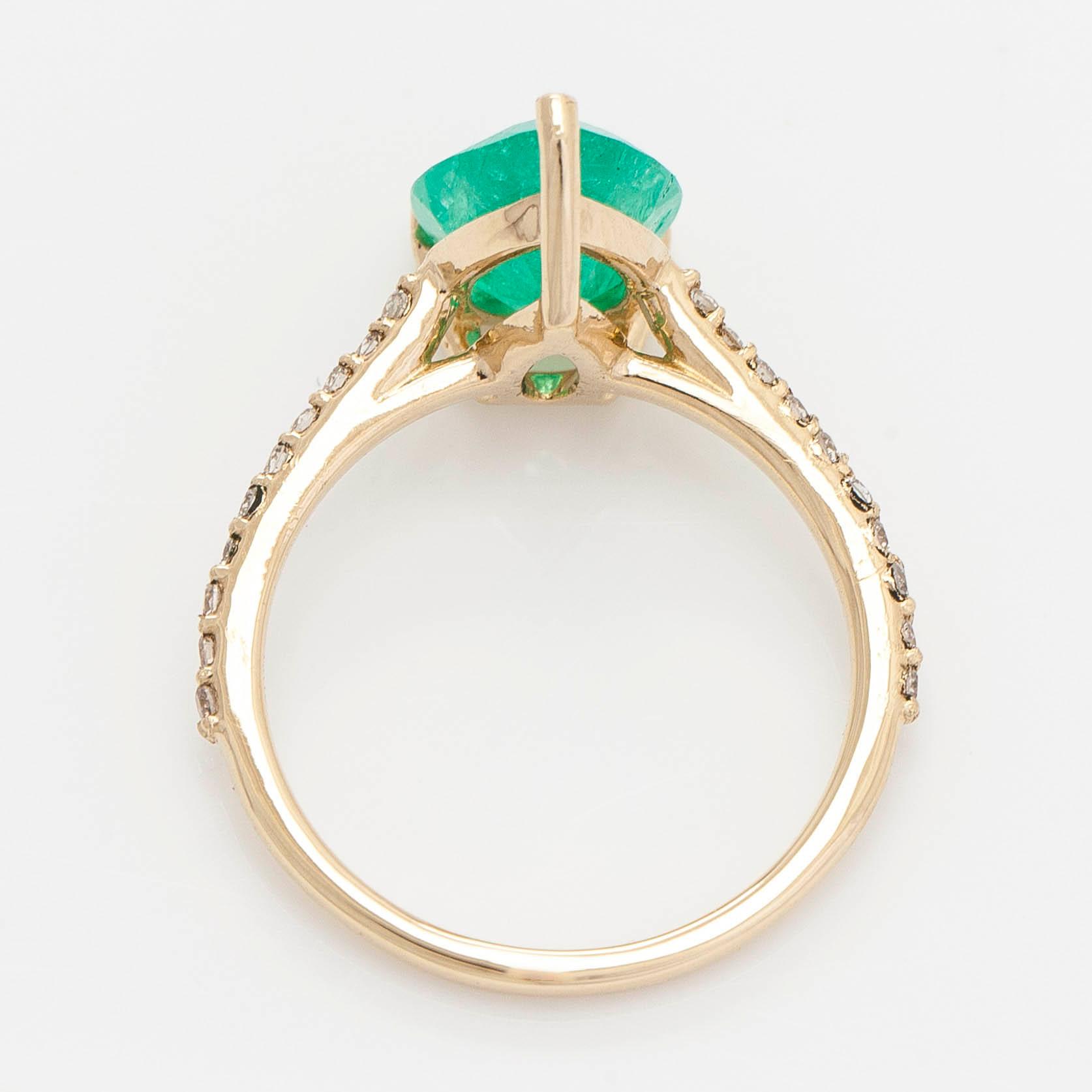 Ring, 14K gold with pear-cut Colombian emerald and diamonds. Accompanied by GIA report.