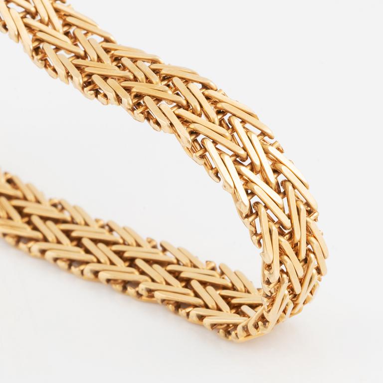 Guldlänk, 18K guld.
