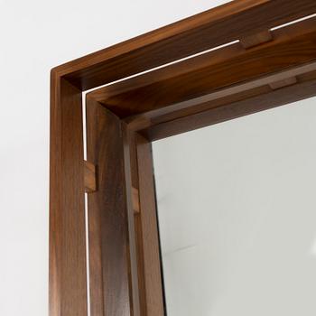 A 1950/60's mirror with chest of drawers.