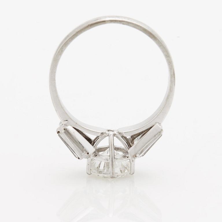 A RING set with a brilliant-cut diamond.