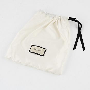 Gucci, a black leather 'Interlocking G' bag.