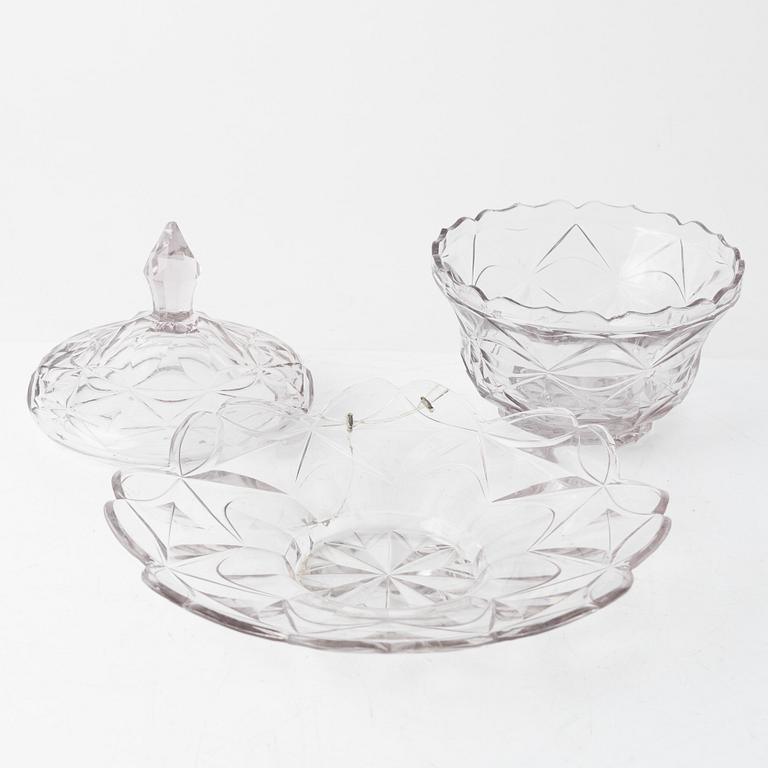 A pair of lidded glass bowls with stands, late 19th century.