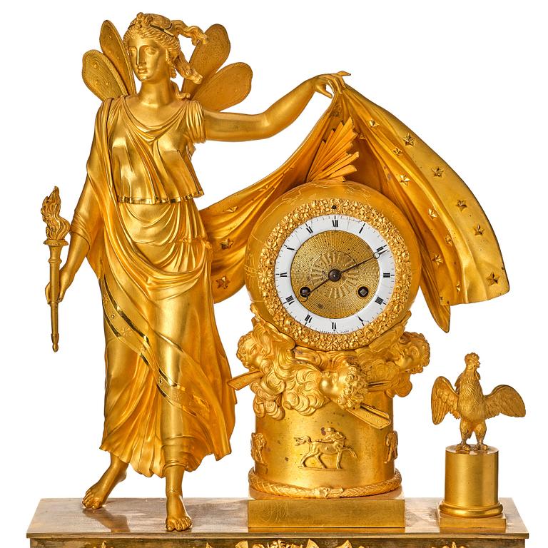 A French Empire mantel clock. Marked "LE NEPVEU A PARIS".