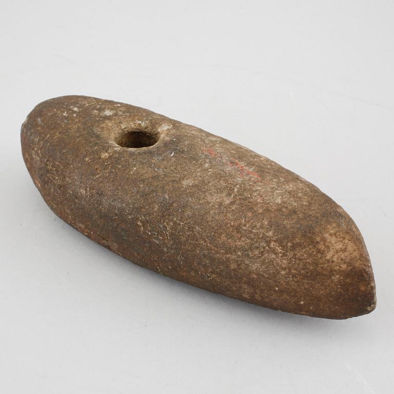 A Swedish shaft hole axe of rock from the Neolithic Age or later.